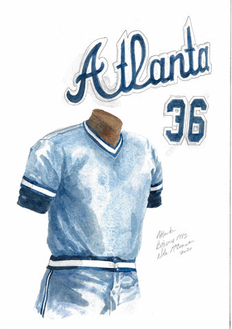 This is a framed original watercolor painting of the 1982 Atlanta Braves uniform.