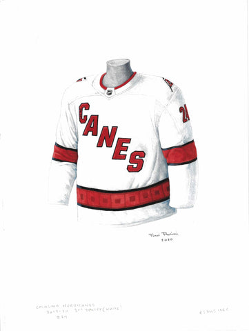 This is a framed original watercolor painting of the 2019-20 Carolina Hurricanes jersey.