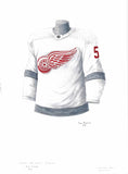 This is a framed original watercolor painting of the 2020-21 Detroit Red Wings jersey.
