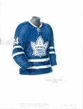 This is a framed original watercolor painting of the 1963-64 Toronto Maple Leafs jersey.